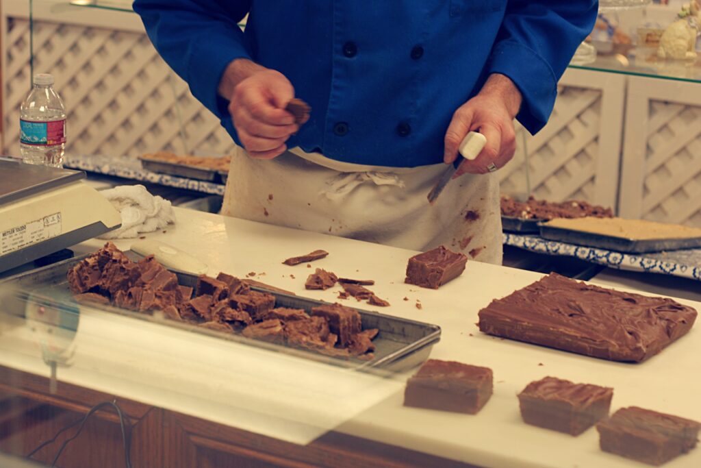 Step-by-step process of preparing vegan fudge, highlighting the mixing of ingredients to achieve the perfect consistency.