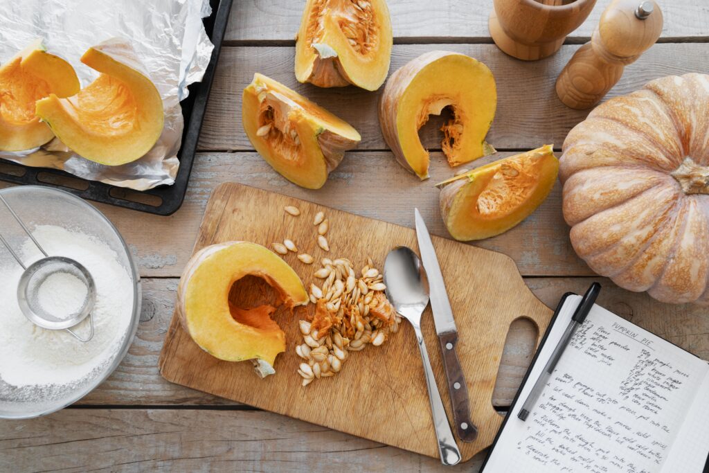 Freshly baked pumpkin muffins arranged on a rustic kitchen counter, highlighting the simplicity and charm of the two-ingredient recipe.