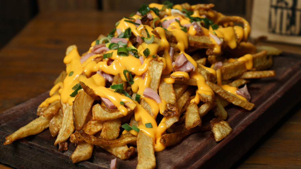 Assorted nacho fries loaded with different toppings like cheese, jalapenos, and sour cream, perfect for a customization guide