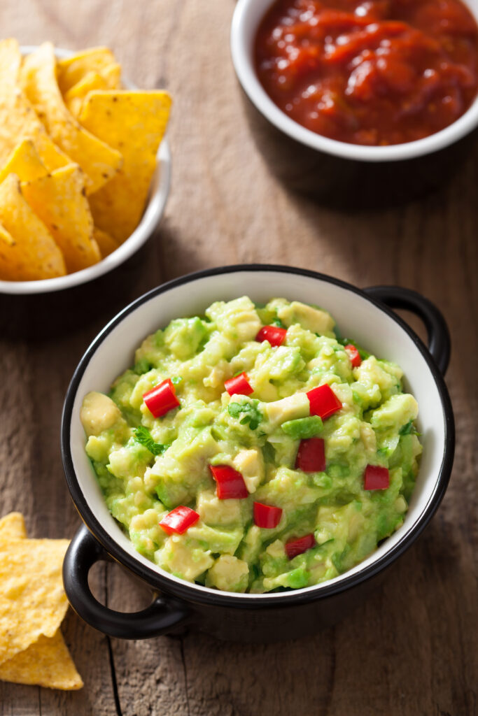 guacamole with avocado, lime, chili and tortilla chips